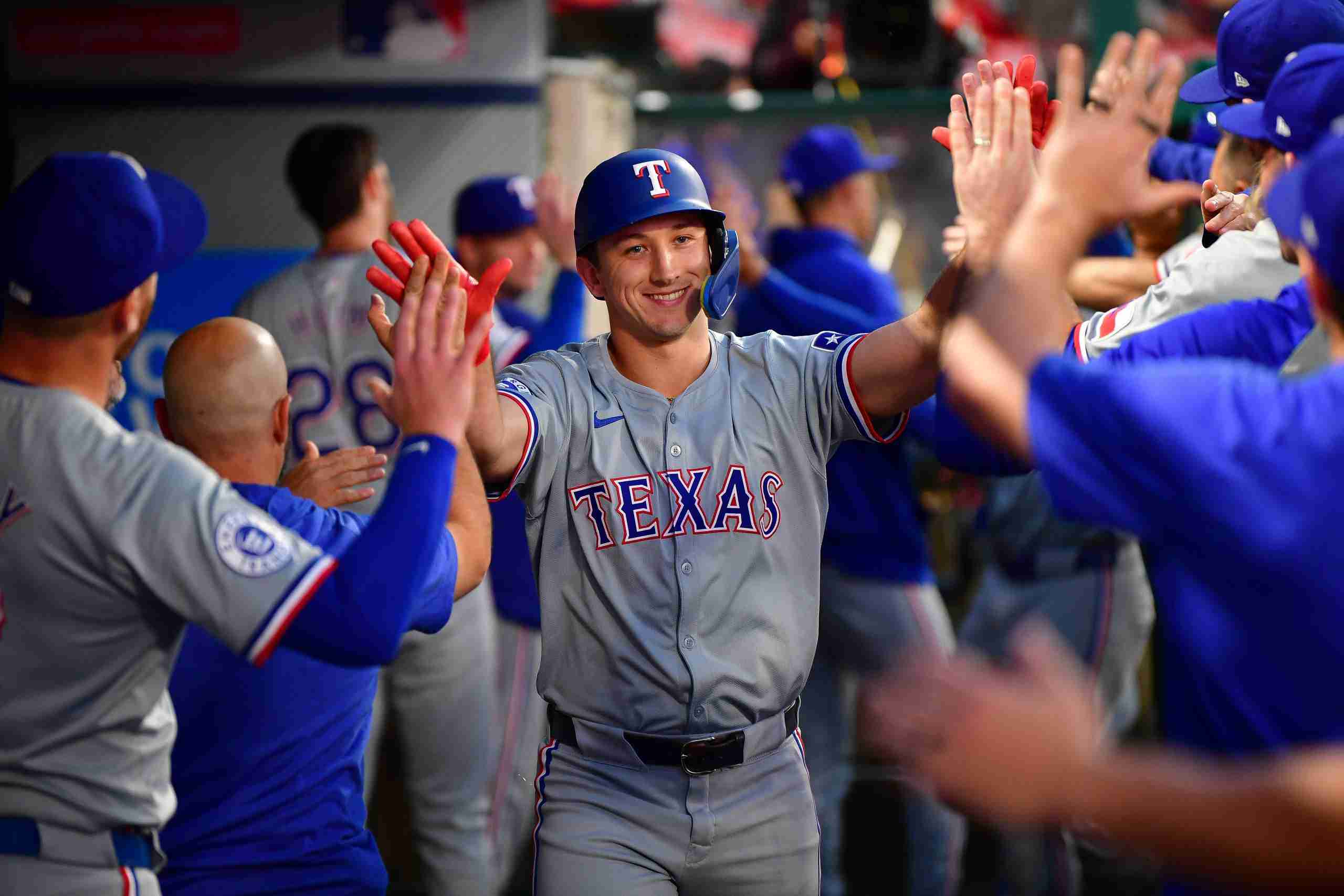 Sep 27, 2024; Anaheim, California, USA; Texas Rangers center fielder Wyatt Langford (36) celebrates after hitting a two run home run against the Los Angeles Angels during the first inning at Angel Stadium. Mandatory Credit: Gary A. Vasquez-Imagn Images